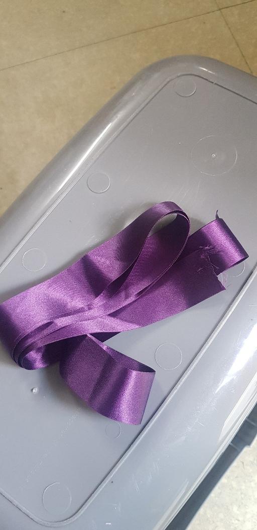  — purple slik ribbon