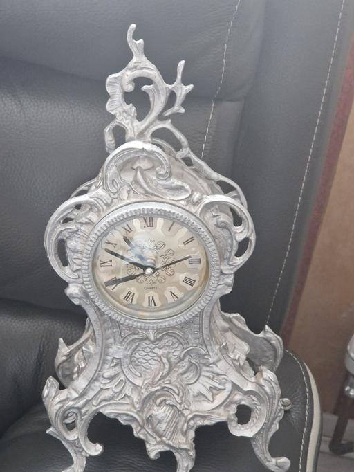  — LARGE SILVER ORNATE MANTLE CLOCK