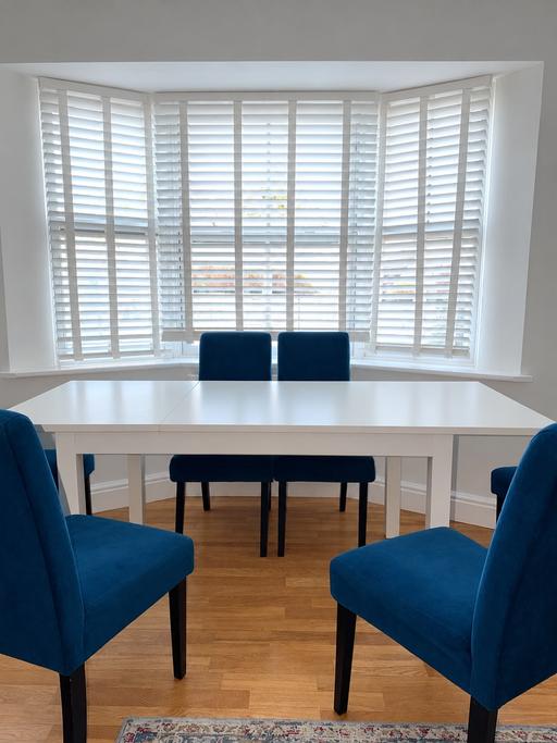  — White Dining Table with 6 Blue Velvet Chairs