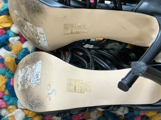  — Guess strappy heeled shoes