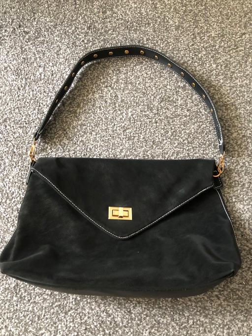  — Handbag