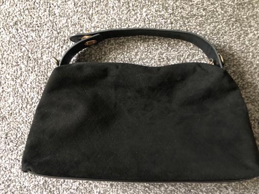  — Handbag