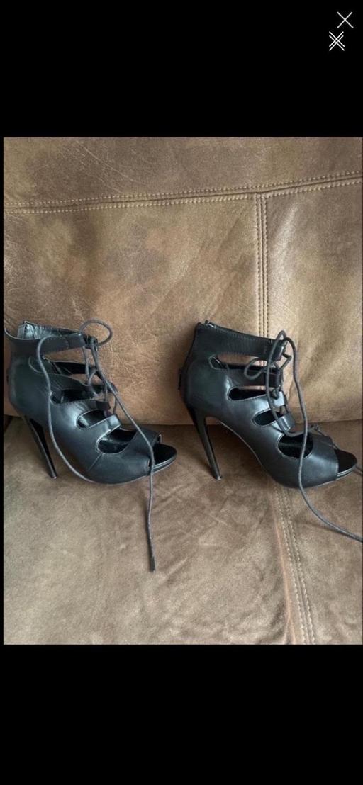  — Black Stilettos Size 4