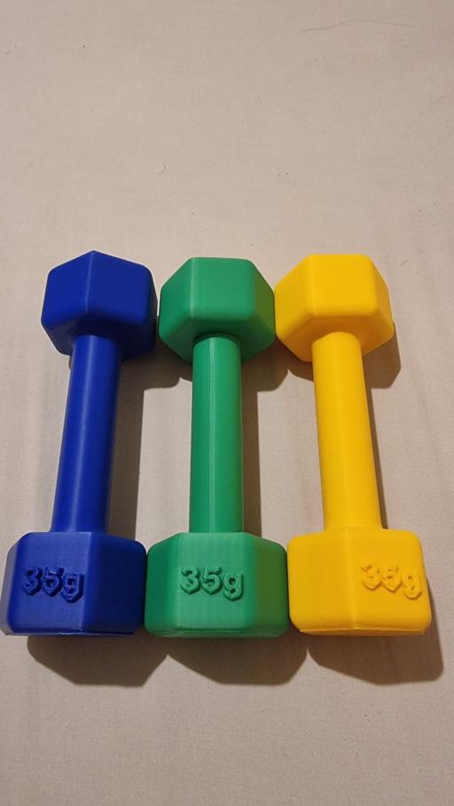  — Plastic Dumbbell Baby Rattles