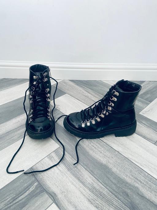  — (4) BOOTS