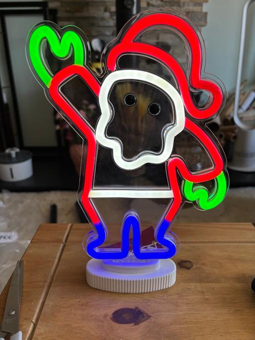  — 27cm lit waving Santa