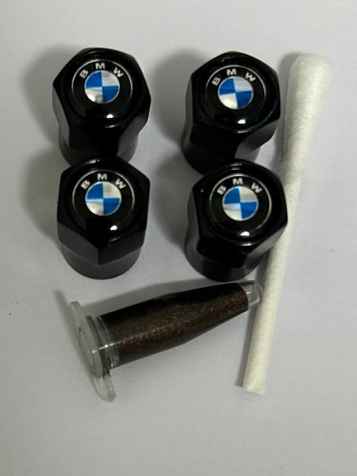  — BMW Tyre valve caps with grease