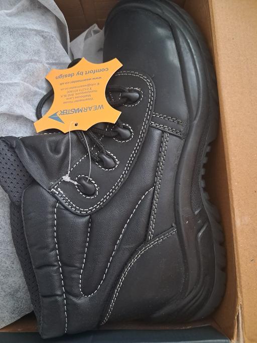  — 2 pairs of New hardware boots, sizes 9 and 11