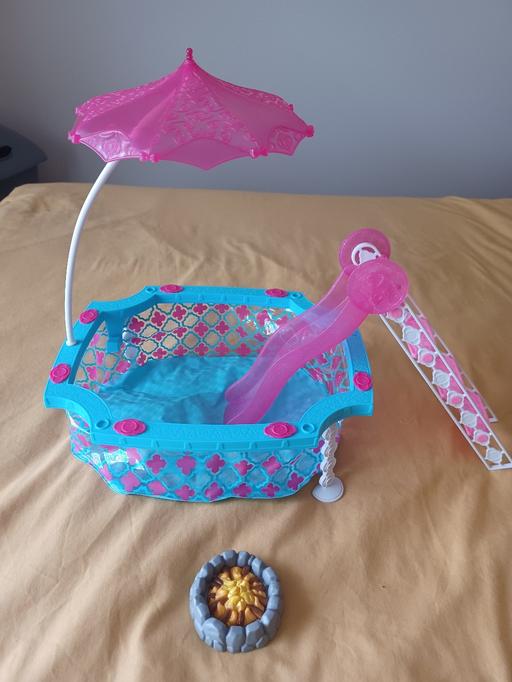 — barbie swimming pool