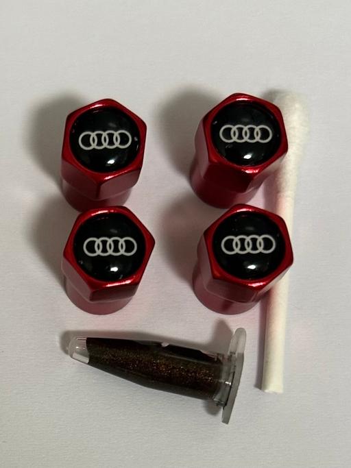  — Audi Tyre valve caps with grease