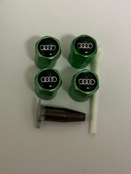  — Audi Tyre valve caps with grease