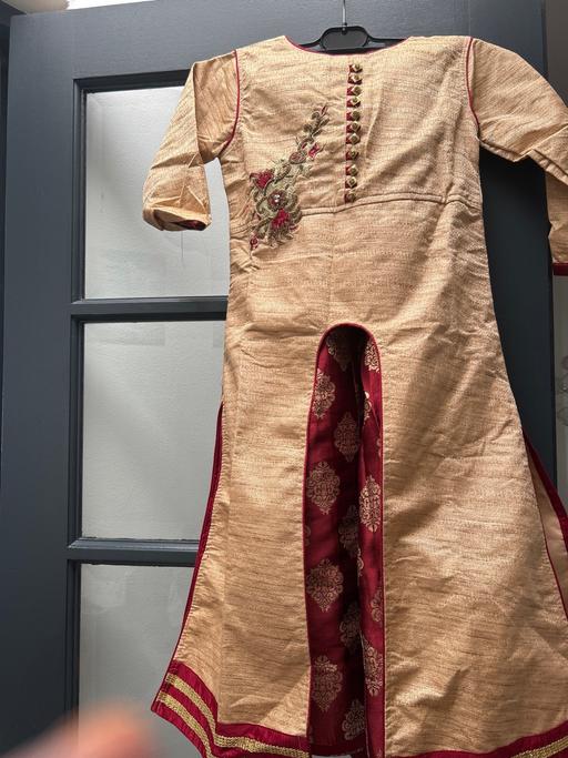  — Dress