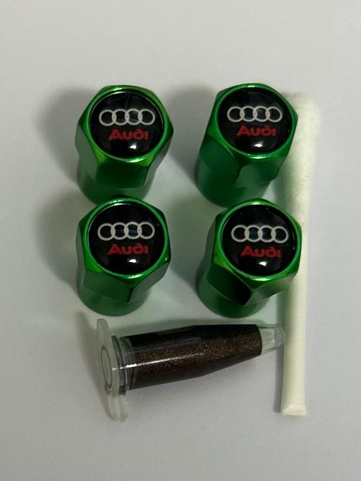  — Audi Tyre valve caps with grease
