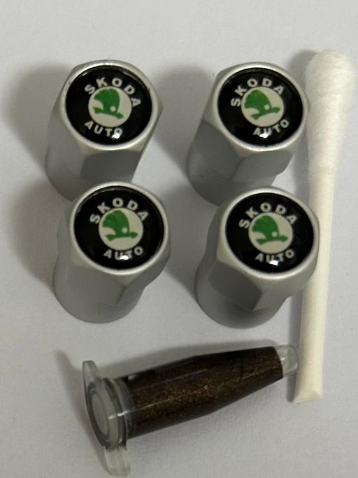  — Skoda tyre valve caps with grease