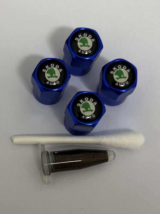  — Skoda tyre valve caps with grease