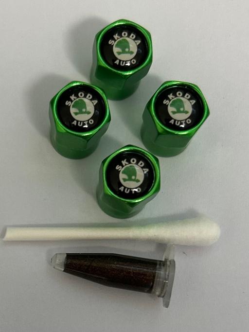  — Skoda tyre valve caps with grease