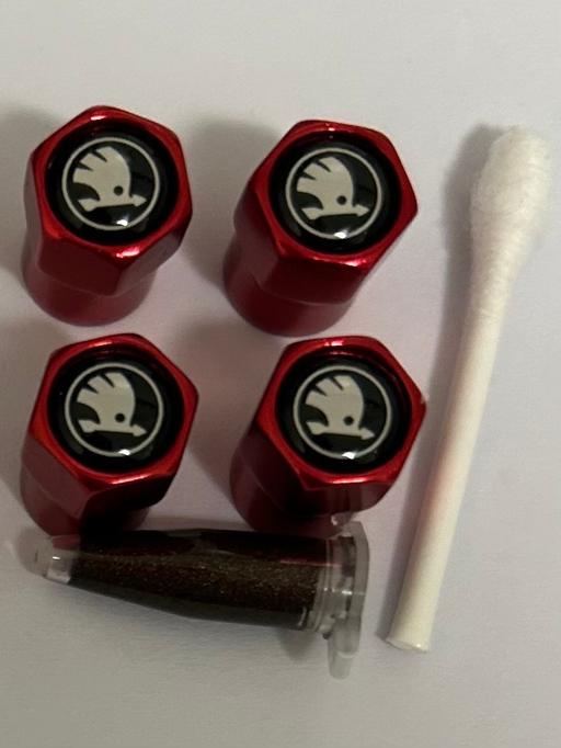  — Skoda tyre valve caps with grease