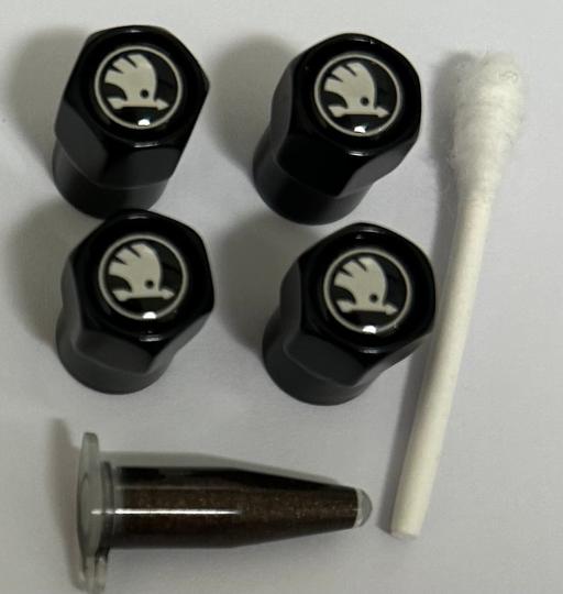  — Skoda tyre valve caps with grease