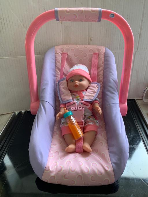  — Doll and carry-chair