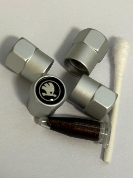  — Skoda tyre valve caps with grease