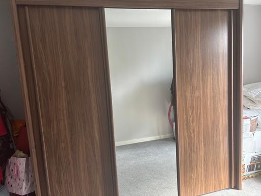  — Brown wooden wardrobe