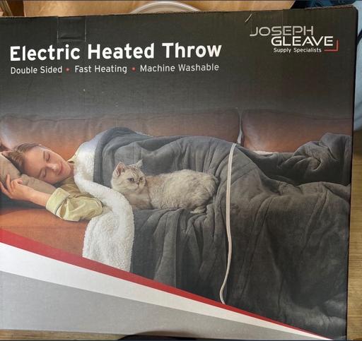  — Brand new electric throw