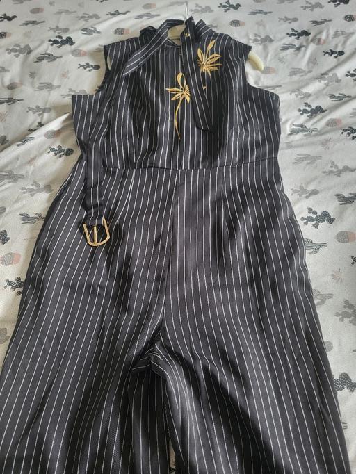  — Sleeveless jumpsuit Size 14