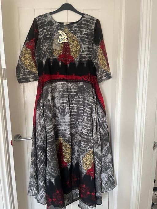  — Dress