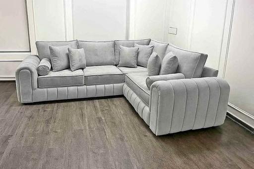  — DFS Corner Sectional Sofa in Ottoman Style