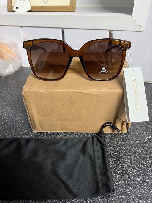  — Monsoon sunglasses