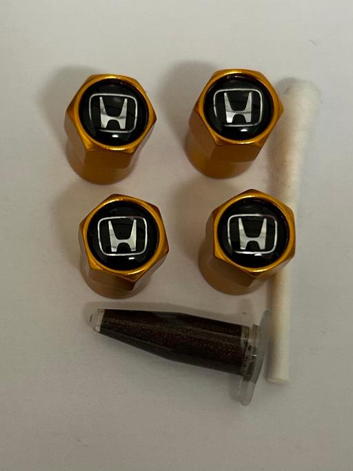  — Honda tyre valve caps with grease