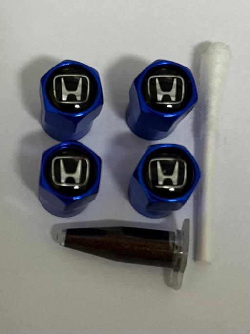  — Honda tyre valve caps with grease