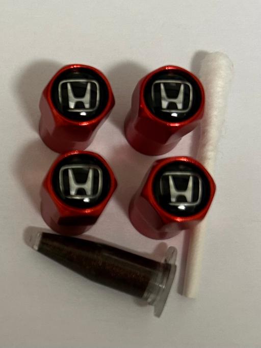  — Honda tyre valve caps with grease