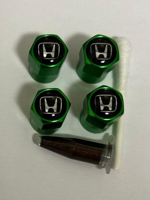  — Honda tyre valve caps with grease