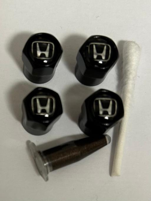  — Honda tyre valve caps with grease