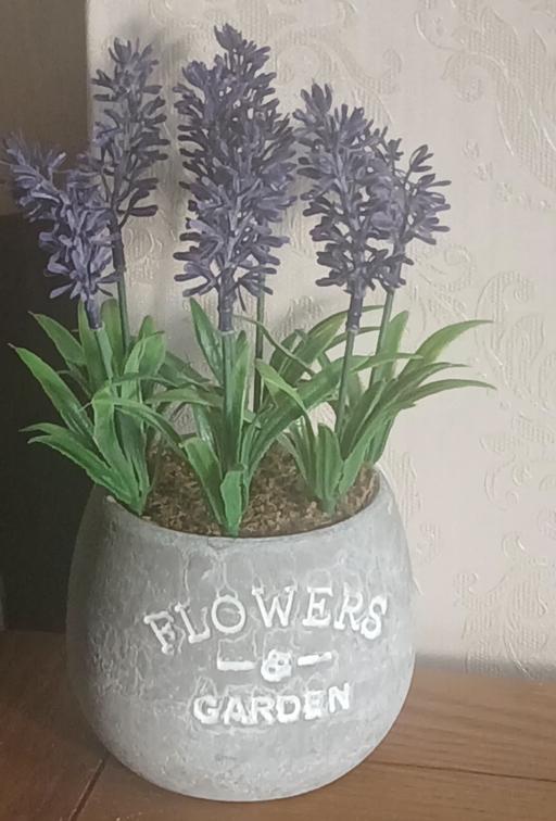 — Artificial flowers)