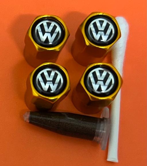  — Volkswagen Tyre valve caps with grease