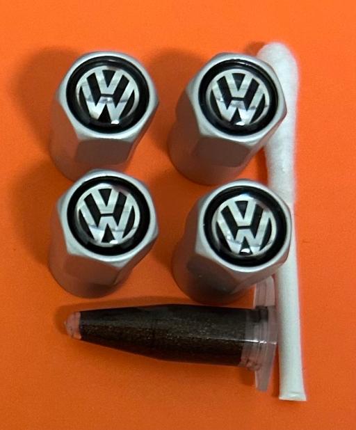  — Volkswagen Tyre valve caps with grease