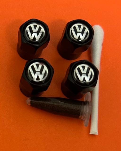  — Volkswagen Tyre valve caps with grease