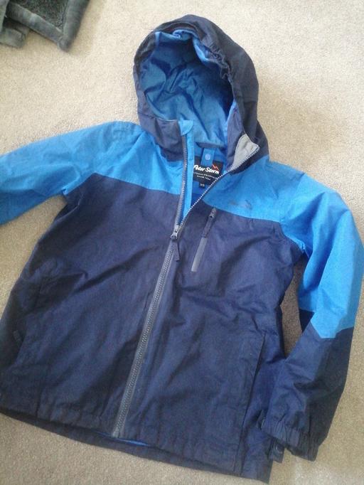  — Peter Storm rain jacket age 9-10 boys