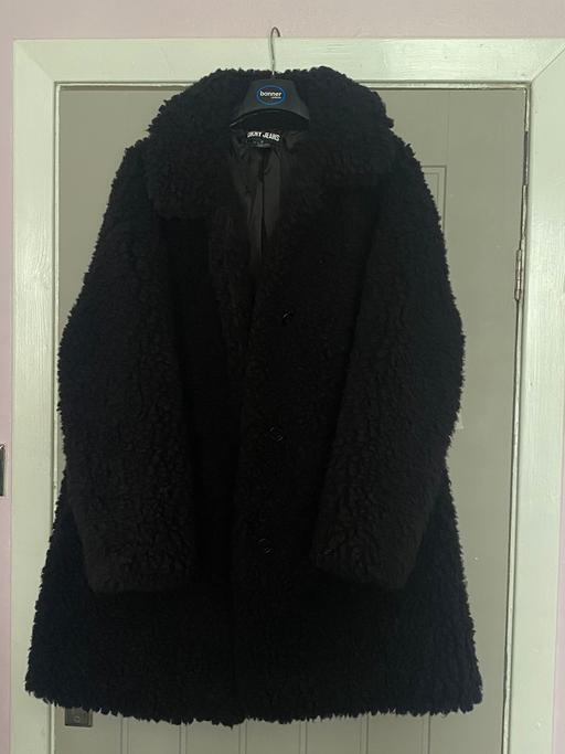  — women's black dkny teddy coat