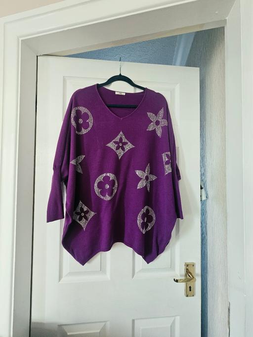  — Shimmer jumper, size 18/20.