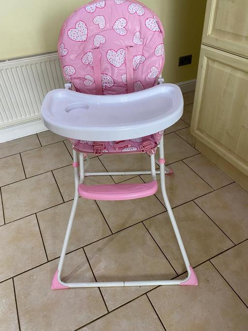  — pink highchair