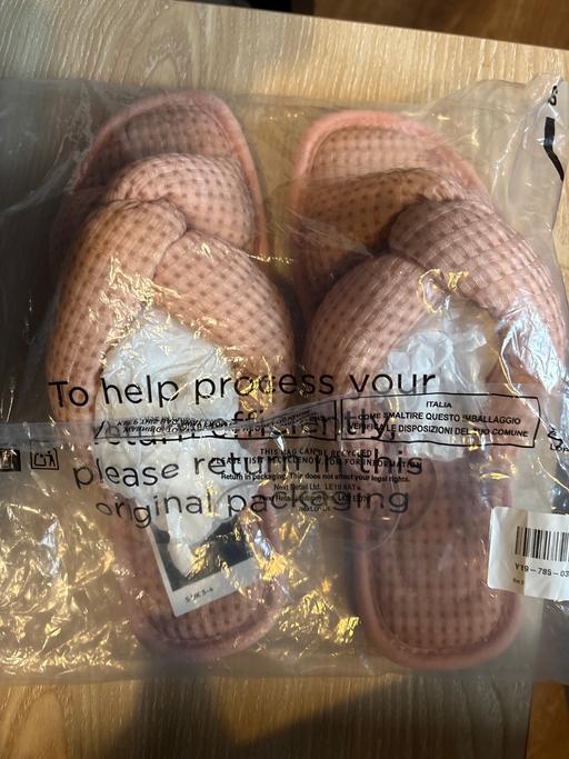  — Next Slippers