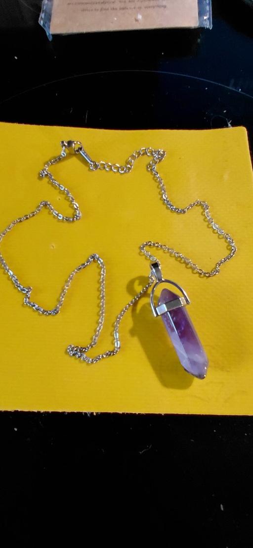 — Amethyst Crystal point pendant.