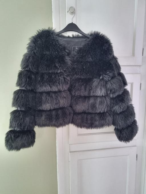  — new faux fur coat