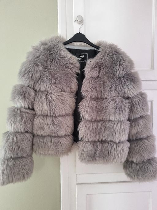 — new faux fur coat