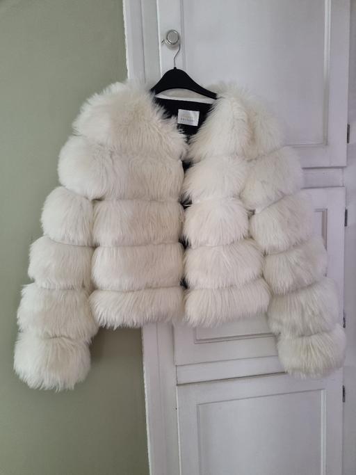  — new faux fur coat