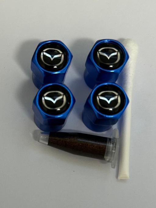  — Mazda Tyre valve caps with grease