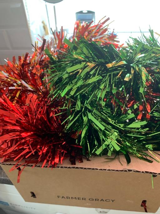  — Xmas tinsel buyer collect